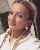 Nelly is single in Corona, NY USA