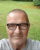 Travis is single in Calhoun, GA USA