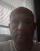 Travis is single in Eriline, KY USA