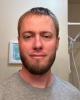 Travis is single in Sioux Center, IA USA