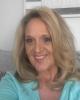 Rita is single in Powderly, KY USA