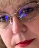 Kim is single in Denison, TX USA
