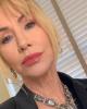Judy is single in Regina, SK CAN